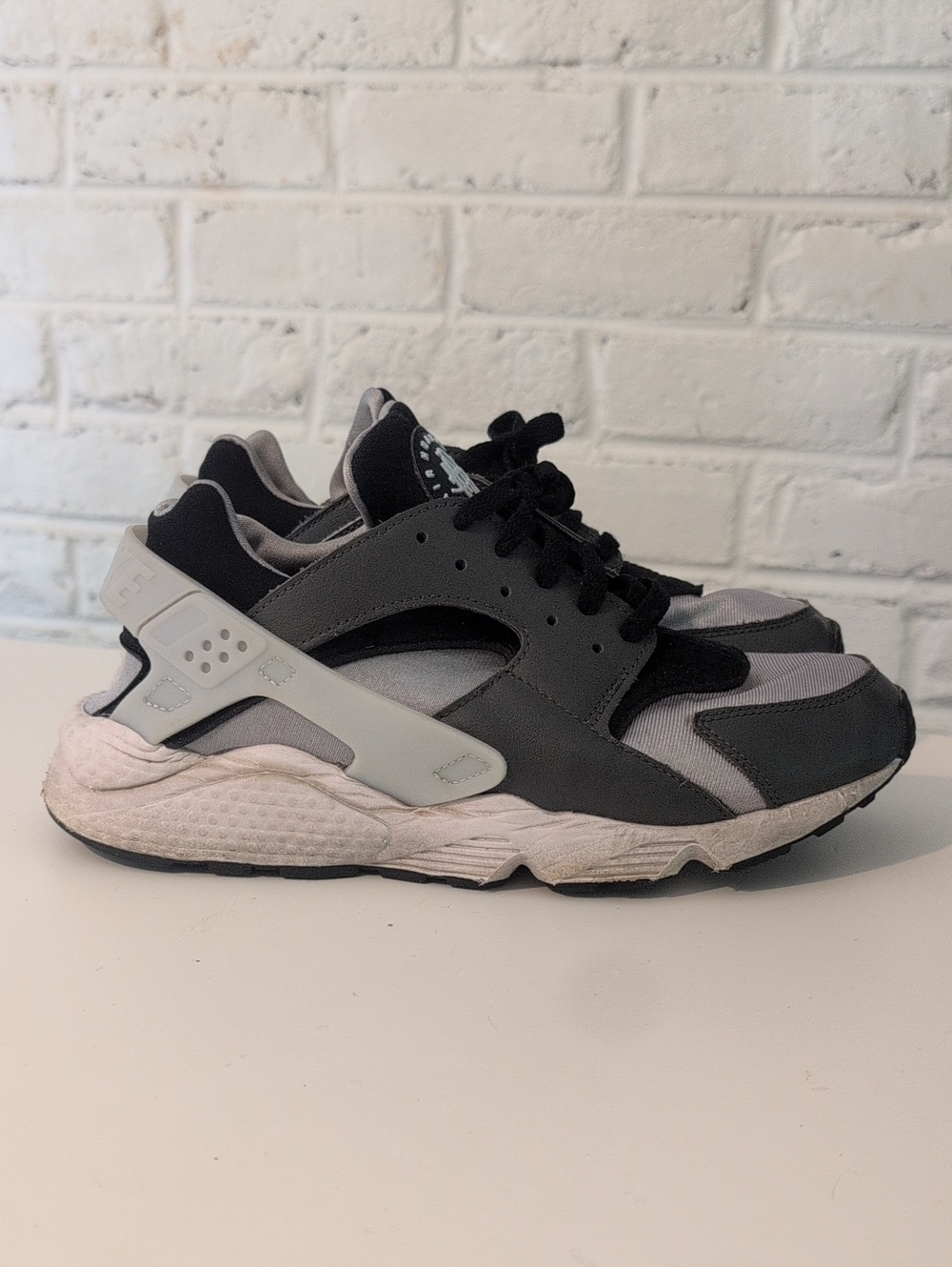 Nike Air Huarache Light Gray and Black Athletic Sneakers